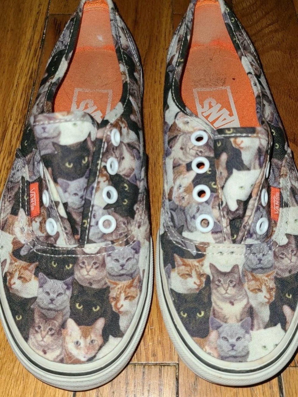 Vans Slip-On Sneakers in Multi Cat Print and Orange Insole